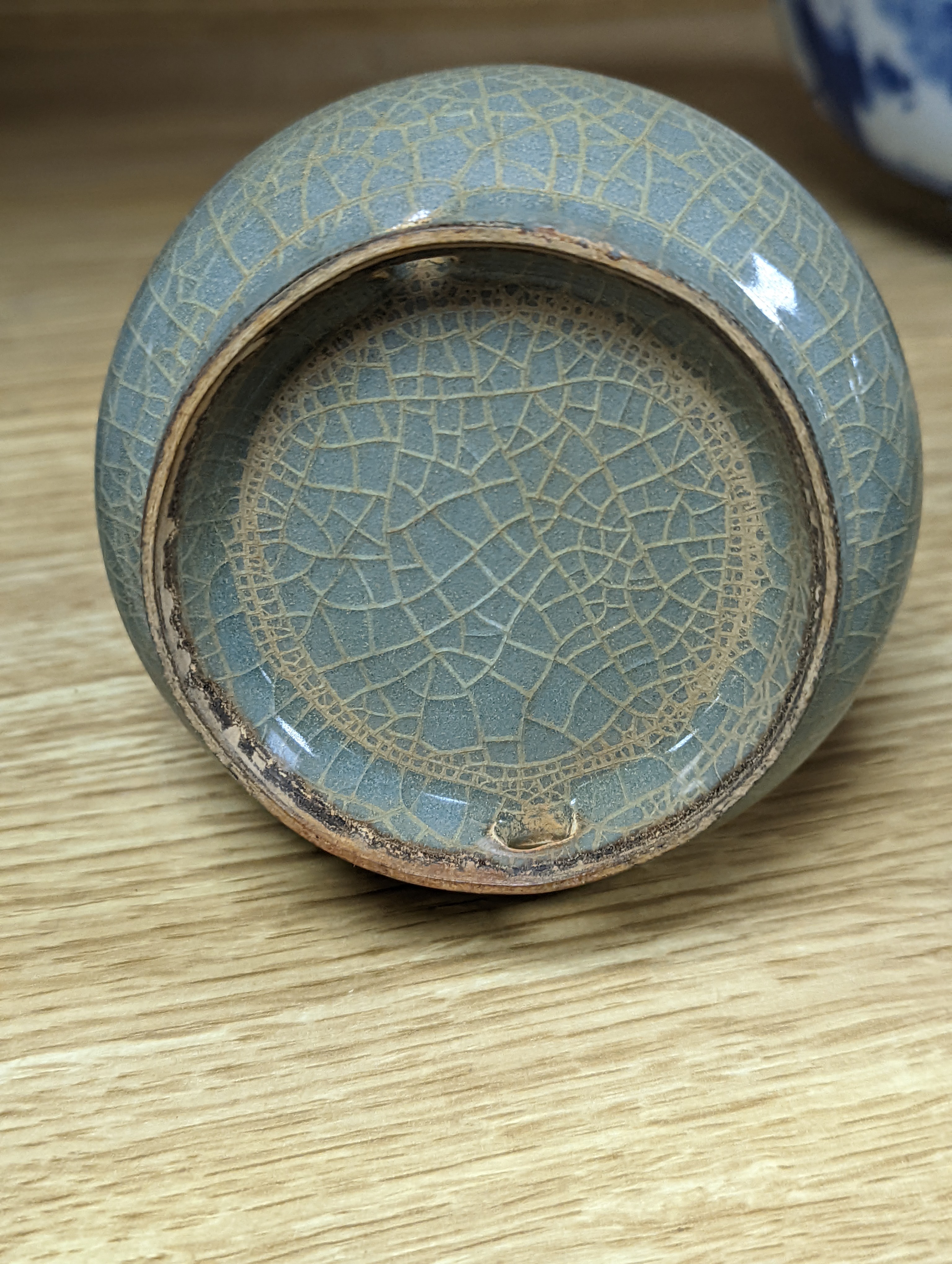 A Chinese celadon bottle vase 15.5cm